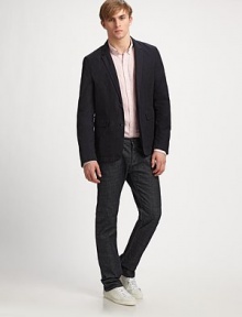 Lightweight, structured blazer with a casual sensibility, in a modern-fitting silhouette.ButtonfrontChest welt, waist flap pocketsAbout 28 from shoulder to hemCottonDry cleanImported