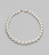 Elegant organic white man-made pearls make a perfect finishing touch. 14mm white round pearls Length, about 20 Mabé pearl and 18k gold vermeil push-lock clasp Made in Spain