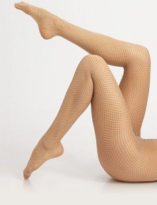 Fine, elegant tights with allover mini-dots for a minimalistic, chic design. Soft, smooth waistbandFlat toe seam78% polyamide/12% elastane/10% polyesterHand washMade in Austria Fine, elegant tights with allover mini-dots for a minimalistic, chic design. Soft, smooth waistbandFlat toe seam78% polyamide/12% elastane/10% polyesterHand washMade in Austria