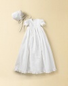 A lovely style with graceful embroidery and ruffle trim. Comes with matching bonnet Puff sleeves Gathered skirt for fullness Back button closure Two layers of cotton lining Cotton; dry clean Imported FIT RECOMMENDATION: Please note that this style runs small.