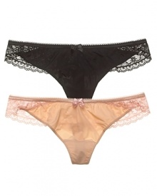 A smooth microfiber thong with pretty lace detail along sides of waist. A smooth microfiber thong with pretty lace detail along sides of waist.