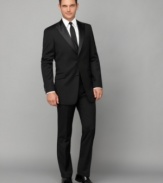 Why rent? Suit yourself the proper way with this classic tuxedo jacket from Tommy Hilfiger.