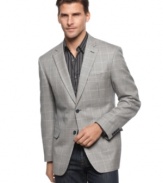 Give your dress look an extra layer of distinction with this handsome houndstooth blazer from Tasso Elba.