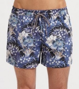 The ultimate tropical style for the beach and beyond in smooth, quick-dry nylon. Elastic drawstring waist Side slash, back zip pockets Mesh lining Inseam, about 4 Nylon Machine wash Imported 
