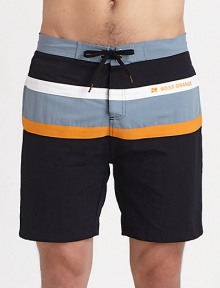 Classic fit swim style in a colorful wide stripe pattern with logo detail.Drawstring waistSide slash pockets48% modal/48% pima cotton/4% spandexMachine WashImported Classic fit swim style in a colorful wide stripe pattern with logo detail.Drawstring waistSide slash pockets48% modal/48% pima cotton/4% spandexMachine WashImported