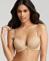 Padded bra with underwire and lace trim at top. Ultra soft lining. Adjustable straps with Calvin Klein Underwear logo on strap. Hook and eye closure. Style #F2892