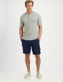 Soft, heathered slub knit gives this classic tee a relaxed edge, echoed in the bold reverse seaming.Crewneck pulloverThree-button placketShort sleeves50% cotton/50% polyesterMachine washImported
