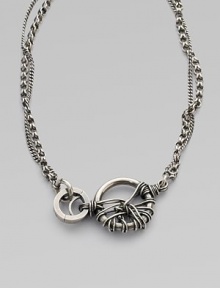 Two chain link strands hold wire-wrapped rings.BrassLength, about 20Hook closureMade in Italy Two chain link strands hold wire-wrapped rings.BrassLength, about 20Hook closureMade in Italy
