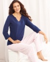 Lounge around in the complete cuteness of Nautica's Pink Dot pajamas. The v-neck long-sleeve top is roomy and comfortable, while the pants feature an elastic waistband with pink ribbon tie and are covered with small navy blue anchor details.