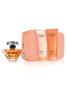 Love. Romance. Elegance. Trésor is for a woman who understands that time is precious and moments in this fast-paced world are to be treasured. The elegance of rose, mugent and lilac, and the sparkle of peach and apricot blossom are just a few notes that define this luminous fragrance. Set includes: 1.7 oz. Eau de Parfum, 2.5 oz. Perfumed Body Lotion, 2.5 oz. Perfumed Shower Gel and a cosmetics bag. Love. Romance. Elegance. Trésor is for a woman who understands that time is precious and moments in this fast-paced world are to be treasured. The elegance of rose, mugent and lilac, and the sparkle of peach and apricot blossom are just a few notes that define this luminous fragrance. Set includes: 1.7 oz. Eau de Parfum, 2.5 oz. Perfumed Body Lotion, 2.5 oz. Perfumed Shower Gel and a cosmetics bag.