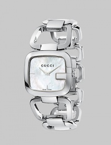 A signature style with a mother-of-pearl dial and a stainless steel bracelet. Quartz movementWater resistant to 3 ATMSquared stainless steel case, 32mm (1.2) X 30mm (1.1)Smooth bezelWhite mother-of-pearl dial with markersStainless steel link braceletMade in Switzerland A signature style with a mother-of-pearl dial and a stainless steel bracelet. Quartz movementWater resistant to 3 ATMSquared stainless steel case, 32mm (1.2) X 30mm (1.1)Smooth bezelWhite mother-of-pearl dial with markersStainless steel link braceletMade in Switzerland