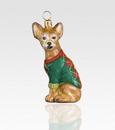 A celebration of Poland's time-honored glassmaking tradition, this charming pup sculpture, dressed in a sparkly argyle sweater, is lovingly crafted by skilled artisans. Mouth-blown Hand-painted Gift boxed 2 high Imported