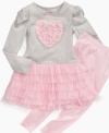 She'll love twirling in this adorable tutu dress with legging set from Flapdoodles featuring pretty rosettes.