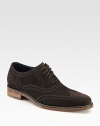 A modern wingtip design with year-round style and versatility, rendered in soft, neatly-perforated suede with a sturdy rubber sole for enhanced traction.Suede upperLeather liningPadded insoleRubber soleImported