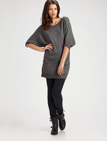 Wrap yourself in this luxe, cozy knit, tailored in a long silhouette with patch pockets for casual style.Boatneck Three-quarter sleeves Ribbed hem Pullover style About 30 from shoulder to hem 33% rayon/23% nylon/18% cotton/18% wool/4% angora/4% cashmere Dry clean Imported
