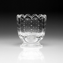 The Polly vase has delicately small cuts running from the base to the scalloped rim. Charming and classical, this piece is a simply beautiful piece of fine crystal. The Polly vase has delicately small cuts running from the base to the scalloped rim. Charming and classical, this piece is a simply beautiful piece of fine crystal.