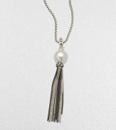 From the Midnight Pearl Collection. An elegant design featuring a lustrous white pearl with diamond accents and a two-tone, sterling silver box chain tassel. About 15-16MM white South Sea pearlDiamonds, .32 tcwSterling silver and blackened sterling silverLength, about 32Lobster clasp closureImported 