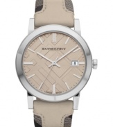 Neutral chic mixed with check patterns: a stylish and precise Burberry timepiece.