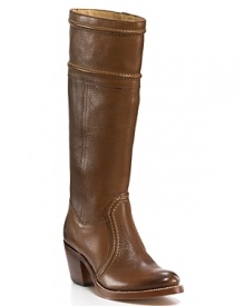 Tall western-inspired leather boots with rugged character and attitude. Tall western-inspired leather boots with rugged character and attitude.