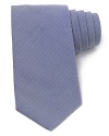 Strengthen your professional appearance with a handsome tie from Armani Collezioni, the perfect dose of refinement.