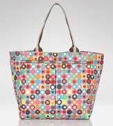 LeSportsac dresses up it's tried and true nylon tote in a bolder is better print. Carry it for effortless on-the-go style.