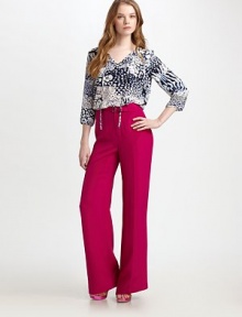 High-waisted, wide-legged and impeccably tailored, all in vibrant matte silk.High waistSelf-beltZip-flyFlat frontPleated legsBack shaping dartsRise, about 11Inseam, about 36SilkDry cleanImportedModel shown is 5'10½ (179cm) wearing US size 4. High-waisted, wide-legged and impeccably tailored, all in vibrant matte silk.High waistSelf-beltZip-flyFlat frontPleated legsBack shaping dartsRise, about 11Inseam, about 36SilkDry cleanImportedModel shown is 5'10½ (179cm) wearing US size 4.
