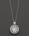 Live the life-- let it shine. The combination of brilliant round stones and long baguettes in the center elevates the luster and beauty of this pendant.