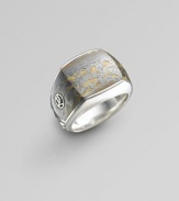 Three-sided, no seam ring with tiger iron design in polished sterling silver. Imported