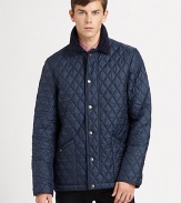 His version of an essential Burberry look, in quilted nylon that's a perfect between-seasons weight, with check lining.Velveteen collarSnap placketSide snap waist tabsFront snap-close pocketsSnap cuffsChecked liningAbout 28 from shoulder to hemNylonDry cleanImported