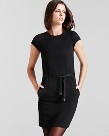 A classic little black dress done the Burberry way--sophisticated, polished, and utterly timeless. A classic little black dress done the Burberry way--sophisticated, polished, and utterly timeless.