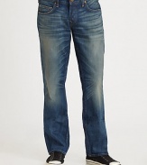 A not-so-basic pair of faded, whiskered denim in a straight-leg style with traditional touches.Five-pocket styleZip flyStitched back pocketsInseam, about 32CottonMachine washMade in USA