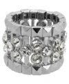 Add flair to your business suit or your cocktail dress. GUESS's sparkling style combines round-cut AB crystals with a polished silver tone mixed metal setting. Size 7.