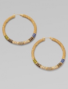 Richly textured hoops set with a stunning spectrum of colored glass stones.GlassBrassDiameter, about 1¾Post backImported Richly textured hoops set with a stunning spectrum of colored glass stones.GlassBrassDiameter, about 1¾Post backImported