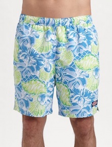 A bright mix of tropical flowers and seashells lends seagoing style to an easy-fitting swim favorite. Elastic waist with internal drawstring Side slash, back patch pockets Mesh lining Inseam, about 7 Polyester Machine wash Imported 