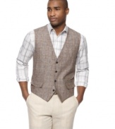 Get invested in your style with this sophisticated plaid vest from Tasso Elba.