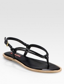 Flat leather design with knot details and an adjustable ankle strap. Leather upperLeather lining and solePadded insoleImportedOUR FIT MODEL RECOMMENDS ordering true size. Flat leather design with knot details and an adjustable ankle strap. Leather upperLeather lining and solePadded insoleImportedOUR FIT MODEL RECOMMENDS ordering true size.