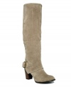 Kick into high gear - and high style! - this season with Nine West's Izusa tall boots. With buckle hardware detailing and a stacked heel, they're available in a selection of neutral tones.