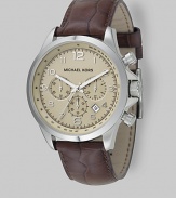 Superior style in stainless steel with heritage-inspired chronograph detail on an embossed leather strap. Quartz movement Water-resistant to 10 ATM Stainless steel case Round case; 44mm diameter (1.73) Three chronograph sub dials Arabic numerals and hour markers Date display at 4:00 Second hand Embossed leather strap Imported 