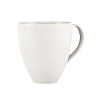 Accented with tonal contrast banding, this mug is modern and sleek. Urban luxury at its most elemental.