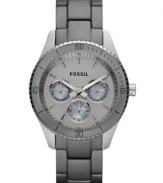 A dusky design blends with mesmerizing mother-of-pearl on this Stella collection watch by Fossil.