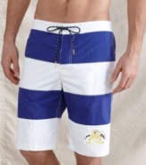 Buoy your beach style with these swim trunks from Tommy Hilfiger.