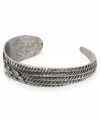 A fashion-forward feather motif defines Lucky Brand's cuff bracelet. Crafted from silver-tone mixed metal. Approximate diameter: 2-1/4 inches.