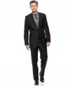 In basic black, this Calvin Klein suit creates the perfect foundation for a look that is strong on details.