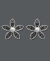 Bonus Buy: Black Diamond Accent Flower Earrings Just $79 with any jewelry purchase (Reg. $250). Earrings are crafted in 14k white gold with black diamond-accented flower petals. Approximate diameter: 1/4 inch.