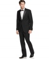 Get a modern take on formalwear in this slim-fit tuxedo from Kenneth Cole New York.