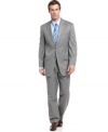 An eternally sophisticated gray suit is right at home in any wardrobe. This look from Izod is an all-around winner.