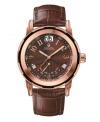 Richly handsome, this Exeter collection watch by Bulova Accutron embraces contemporary hues. Brown croc-embossed leather strap and round rose-gold ion-plated stainless steel case with sapphire crystal. Brown dial features rose-gold tone numerals at markers, minute track, date window at twelve o'clock, day window at six o'clock, luminous hands and logo. Swiss quartz movement. Water resistant to 50 meters. Five-year limited warranty.