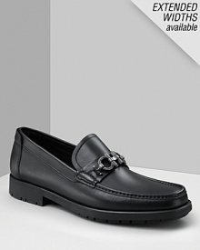 Salvatore Ferragamo Master slides. Leather slides with double gancini brushed silver buckle and tonal topstitching detail throughout. Features slight treading on heel and bottom. Salvatore Ferragamo Master slides. Leather slides with double gancini brushed silver buckle and tonal topstitching detail throughout. Features slight treading on heel and bottom.