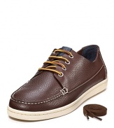 Tumbled leather boat shoe with contrast leather lace-up closure and comfy rubber sole.