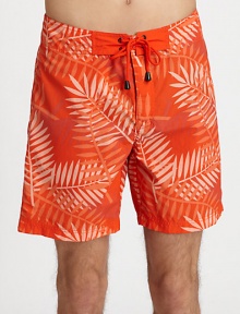 A vibrant, palm print in quick-drying nylon, with drawstring waist for added comfort.Drawstring tie waistInseam, about 5NylonMachine washImported A vibrant, palm print in quick-drying nylon, with drawstring waist for added comfort.Drawstring tie waistInseam, about 5NylonMachine washImported